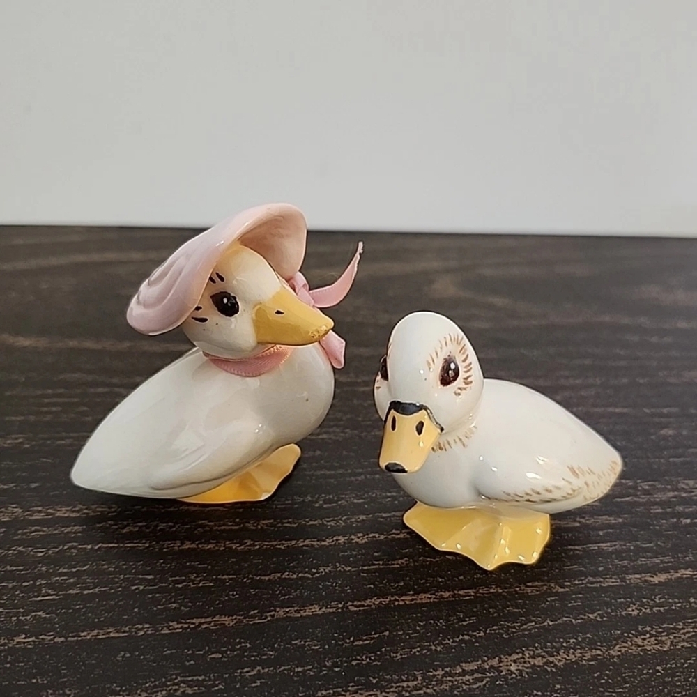 2 Vintage ceramic duck W Bonnet figurine